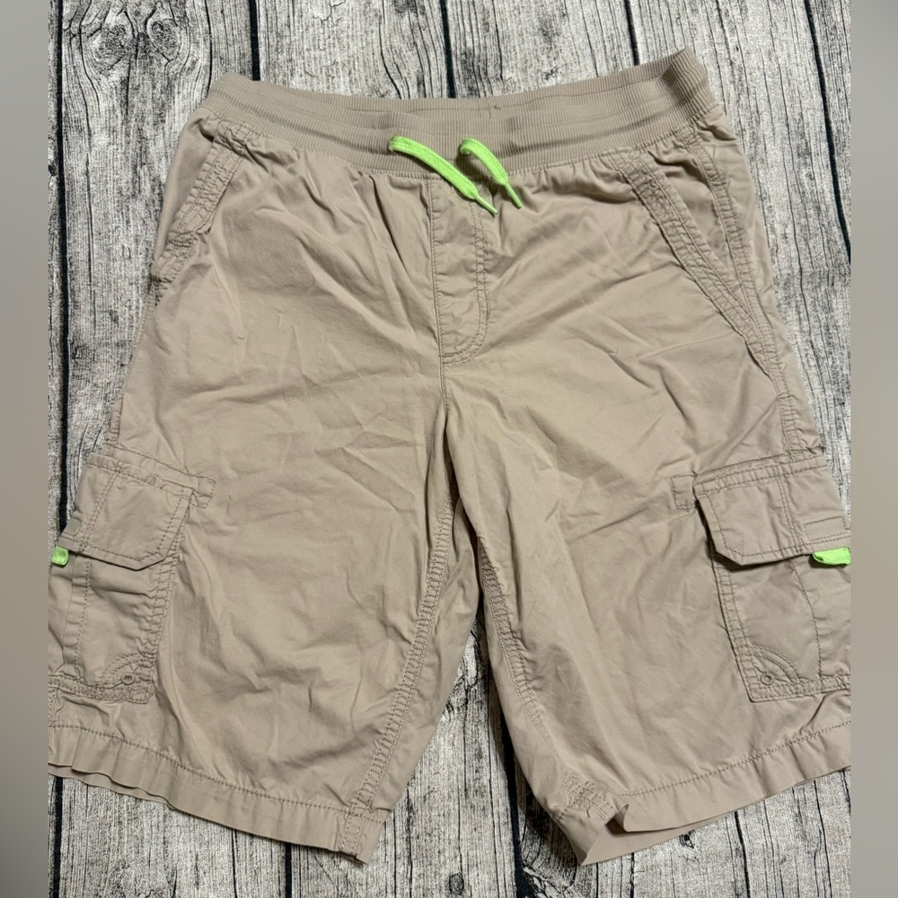Like new. Youth cargo shorts . Size XL (18-20). Tan color/khaki